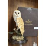 A COUNTRY ARTISTS FIGURE OF AN OWL - BOXED