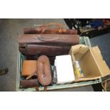 A VINTAGE SATCHEL PLUS TWO BRIEFCASES AND A SELECTION OF EMPTY LEATHER EQUIPMENT CASES