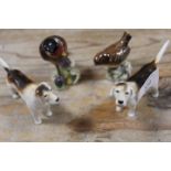 TWO BESWICK FOXHOUND FIGURES TOGETHER WITH TWO BESWICK BIRDS (4)