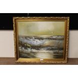 A GILT FRAMED OIL ON CANVAS OF BREAKING WAVES ON A BEACH