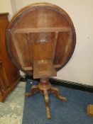 A VICTORIAN MAHOGANY TILT TOP TABLE