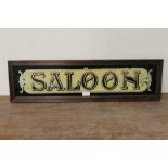 A FRAMED VINTAGE STYLE GLASS SALOON SIGN