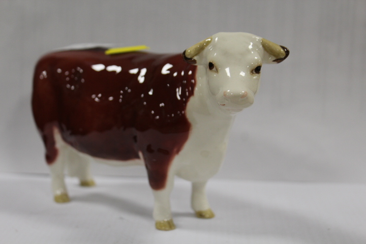 A BESWICK HEREFORD COW