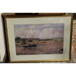 A GILT FRAMED AND GLAZED PRINT OF A FISHING BOAT ON THE RIVER