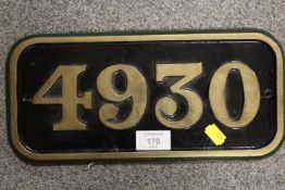 A CAST METAL REPRODUCTION LOCOMOTIVE CAB PLATE