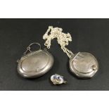 TWO HALLMARKED SILVER POWDER / SNUFF PENDANTS - A/F, TOGETHER WITH A SMALL ENAMELLED 'BASKET'