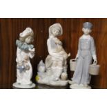 TWO LLADRO FIGURES TOGETHER WITH A NAO FIGURE OF A GIRL DRESSED AS A CLOWN (3)