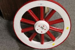 A SMALL VINTAGE PAINTED CART WHEEL