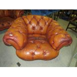 A LARGE TETRAD BROWN LEATHER CHESTERFIELD STYLE CHAIR APPROX W-120 CM
