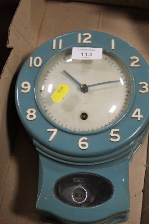 A VINTAGE WALL MOUNTED SMITHS CLOCK