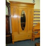 AN EDWARDIAN SATINWOOD WARDROBE