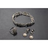 A SILVER MARCASITE BRACELET SET WITH MATCHED RING AND EARRING