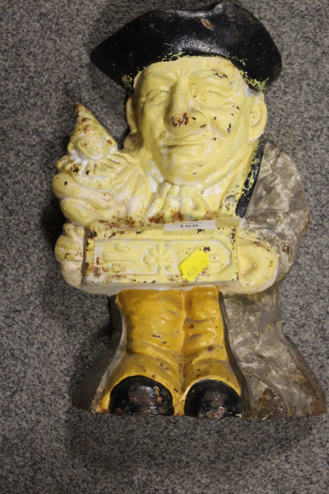 A CAST METAL MR PUNCH DOOR STOP