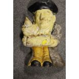 A CAST METAL MR PUNCH DOOR STOP