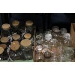 TWO TRAYS OF ASSORTED STORAGE / GLASS JARS ETC