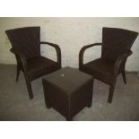 A PAIR OF MODERN UPVC RATTON GARDEN CHAIR AND A TABLE