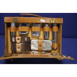 A CASED GENTLEMANS TRAVEL SET