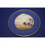 A ROYAL DOULTON H. ALLEN SIGNED HAND PAINTED CABINET PLATE DEPICTING ARABS IN A DESSERT 26 CM