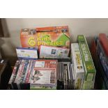 A TRAY OF ASSORTED CDS, JIGSAWS, DVDS ETC (TRAY/S NOT INCLUDED)