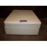 A DOUBLE DRAWER DIVAN BED AND MATTRESS