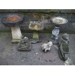 A SELECTION OF CONCRETE STATUES AND BIRD BATHS