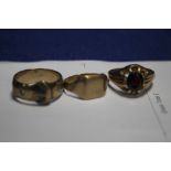 THREE 9CT GOLD RINGS TO INCLUDE A BUCKLE TYPE