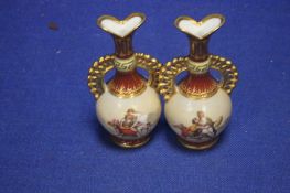 A PAIR OF ROYAL VIENNA HAND PAINTED CABINET VASES SIGNED "WAGNER" EACH DECORATED WITH CLASSICAL