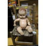A VINTAGE CHILDS CHAIR TOGETHER WITH A DOLL