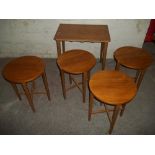 A RETRO TEAK DANISY NESTING TABLES IN THE STYLE OF POUL HUNDEVAD