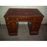 A TWIN PEDESTAL GEORGIAN LEATHER INLAID DESK OF SMALL PROPORTIONS