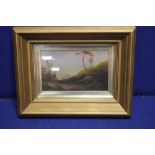 A FRAMED AND GLAZED WATERCOLOUR OF A COASTAL SCENE