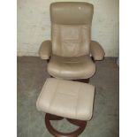 A LEATHER SWIVEL CHAIR AND STOOL