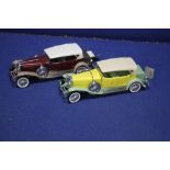 TWO FRANKLIN MINT CARS TO INCLUDE A 1930 DUESENBURG TOURER IN YELLOW AND GREEN TOGETHER WITH A