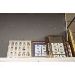 A COLLECTION OF FRAMED CIGARETTE CARDS