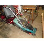 A BOSCH ELECTRIC MOWER AND BOX - HOUSE CLEARANCE