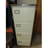 A FOUR DRAWER METAL FILING CABINET