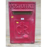 A VINTAGE FIBREGLASS TV PROP OF A POST OFFICE FRONTAGE FOR A WALL POST BOX