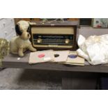 A VINTAGE UNITRA RADIO TOGETHER WITH A SELECTION OF RECORDS , VINTAGE DOG TOY AND A WEDDING DRESS