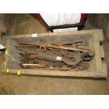 A VINTAGE WOODEN CRATE OF TOOLS RASPS ETC