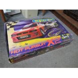 A BOXED SCALEXTRIC HOT PURSUIT X2 - CONTENTS UNCHECKED
