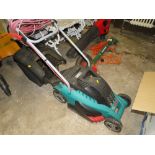 A BOSCH ELECTRIC MOWER WITH BOX