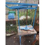 A LARGE VINTAGE BLUE CHEESE PRESS