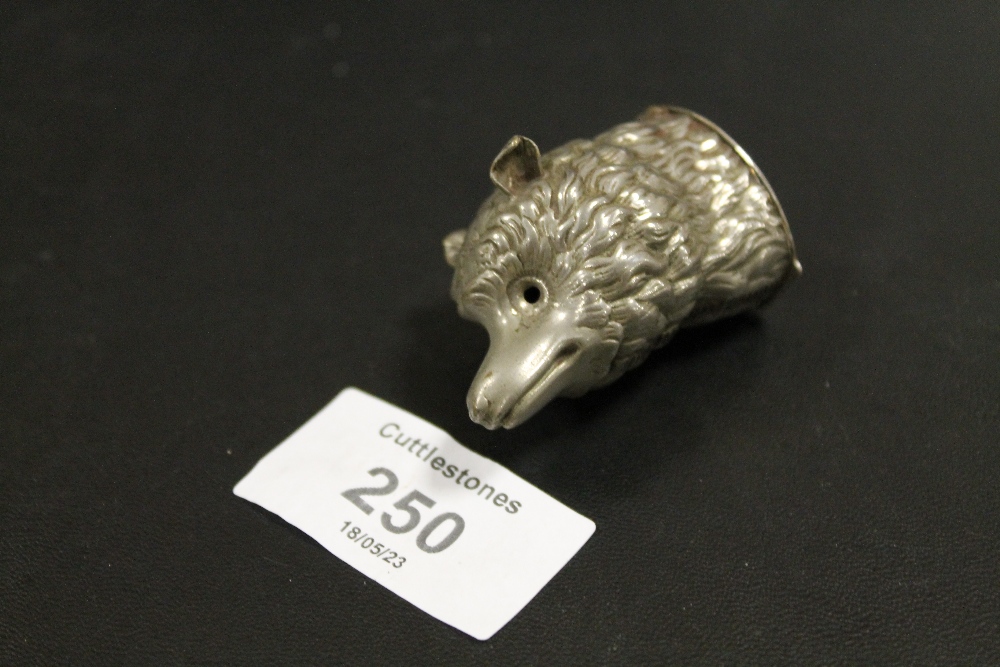 A NOVELTY WHITE METAL VESTA IN THE FORM OF A FOXES HEAD - MISSING EYES