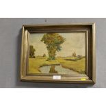 A SMALL GILT FRAMED OIL ON BOARD OF A RURAL RIVER LANDSCAPE