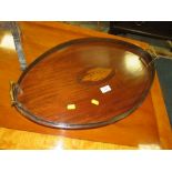 AN ANTIQUE MAHOGANY TWIN-HANDLED SERVING TRAY WITH INLAID DETAIL