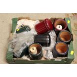 A SMALL TRAY OF LEATHER BOUND DICE SHAKERS AND DICE .ETC.