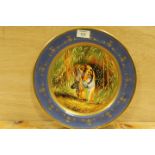 A SIGNED, HANDPAINTED AND GILDED COALPORT PLATE FEATURING A TIGER SIGNED M PINTER