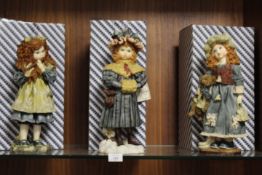 THREE FENTON CHINA RESIN FIGURINES OF CHILDREN - WITH BOXES