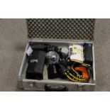 A HARD SHELL TRAVEL CASE CONTAINING ASSORTED PHOTOGRAPHIC EQUIPMENT TO INCLUDE NIKON CAMERA , LENSES