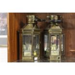 A PAIR OF VINTAGE BRASS CARRIAGE LANTERNS